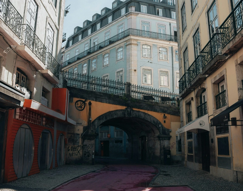 Pink Street Lisbon during the day — empty pink pavement on Rua Nova do Carvalho, Cais do Sodré